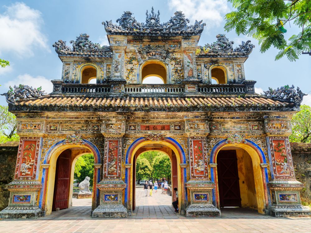 The East Gate (Hien Nhon Gate) to the Citadel with the Imperial City in Hue, Vietnam. The colorful gate is a popular tourist attraction of Hue.